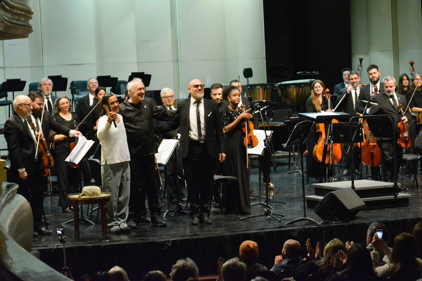 Final bow of the premiere: Pablo Salcedo, Maestro Nicolas Rauss, and composer Juan Rivero with the orchestra